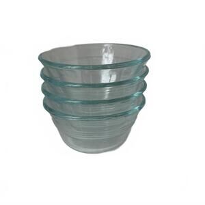 A set of four vintage Pyrex ribbed glass custard cups or prep bowls.